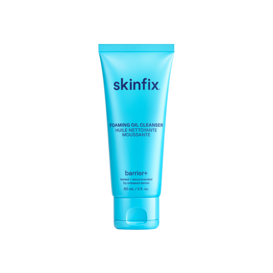 A light blue squeeze tube of skinfix Foaming Oil Cleanser with dark blue text, shown on a solid white background.